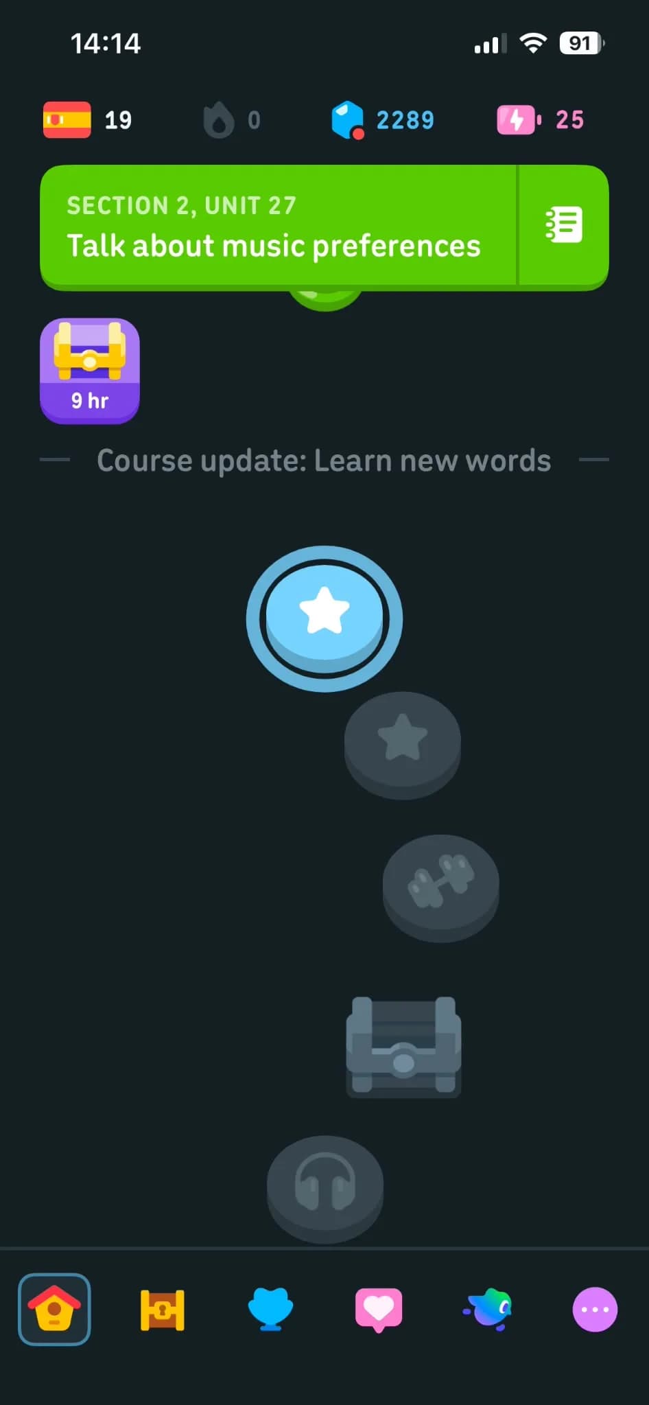 My Duolingo home screen on Section 2, Unit 27, 'Talk about music preferences', with a 'Course update: Learn new words' divider, a lesson star, a practice dumbbell, a chest and a listening headphones icon