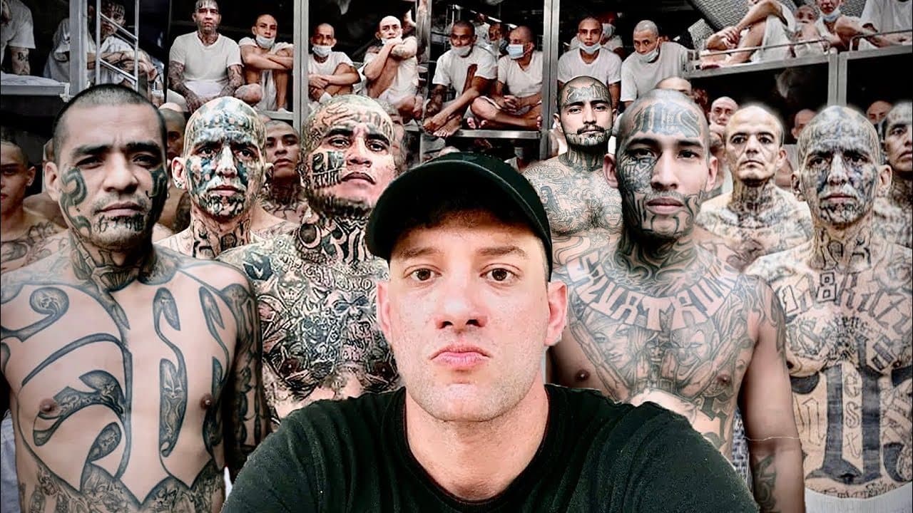 Thumbnail for Timmy Karter's CECOT video: rows of heavily tattooed inmates in white standing behind a man in a black cap
